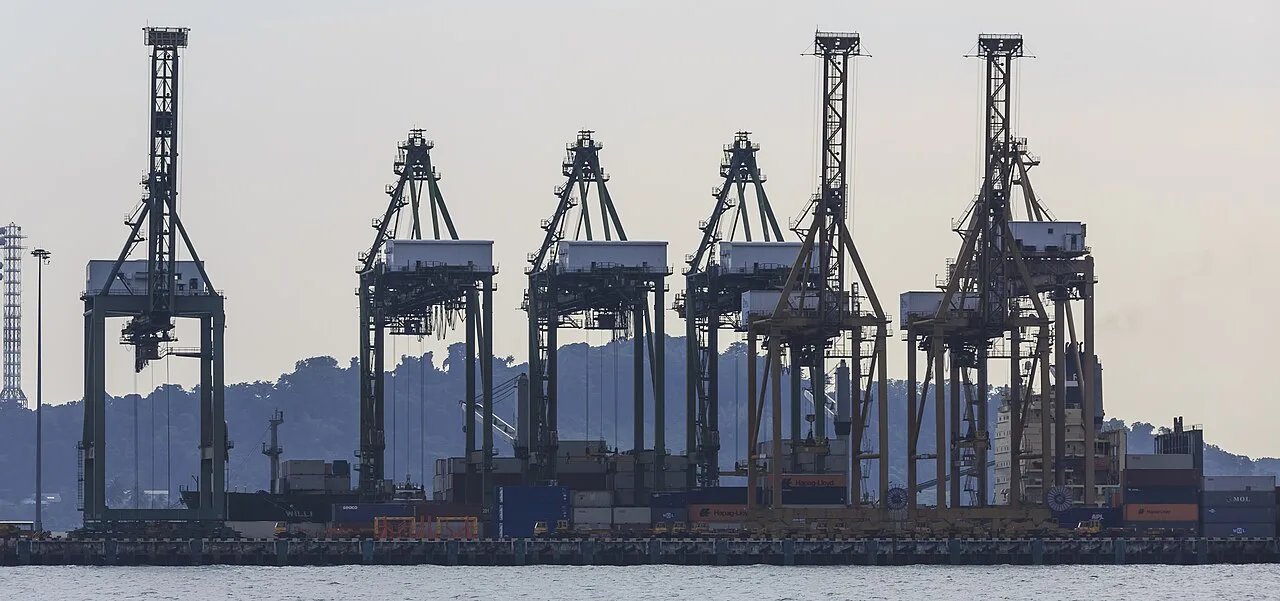 Shipping containers and cranes at the Singapore cargo terminal