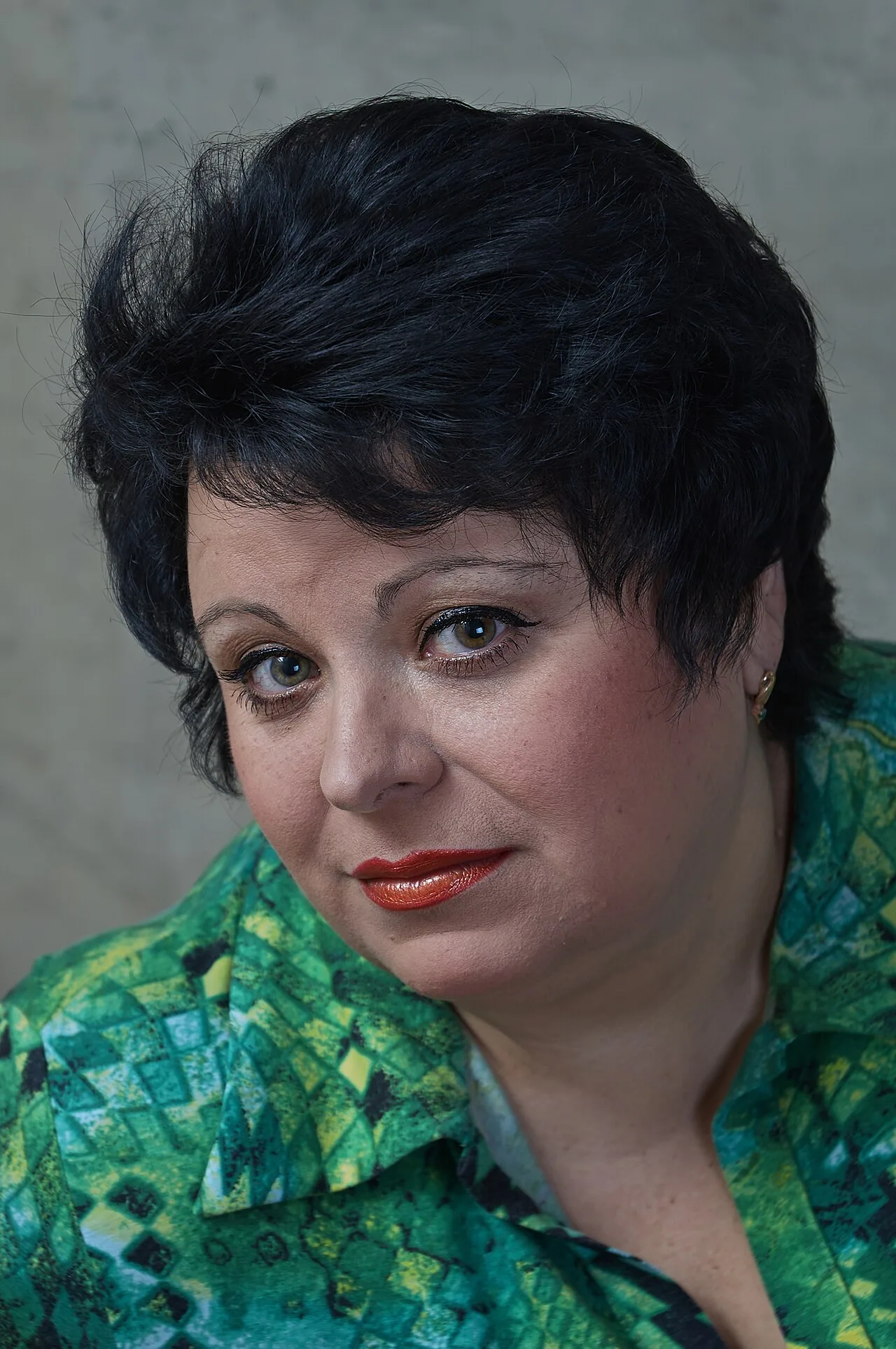 Studio portrait of a woman representing independent adult cam models